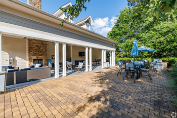 Cabana with outdoor fireplace and kitchen